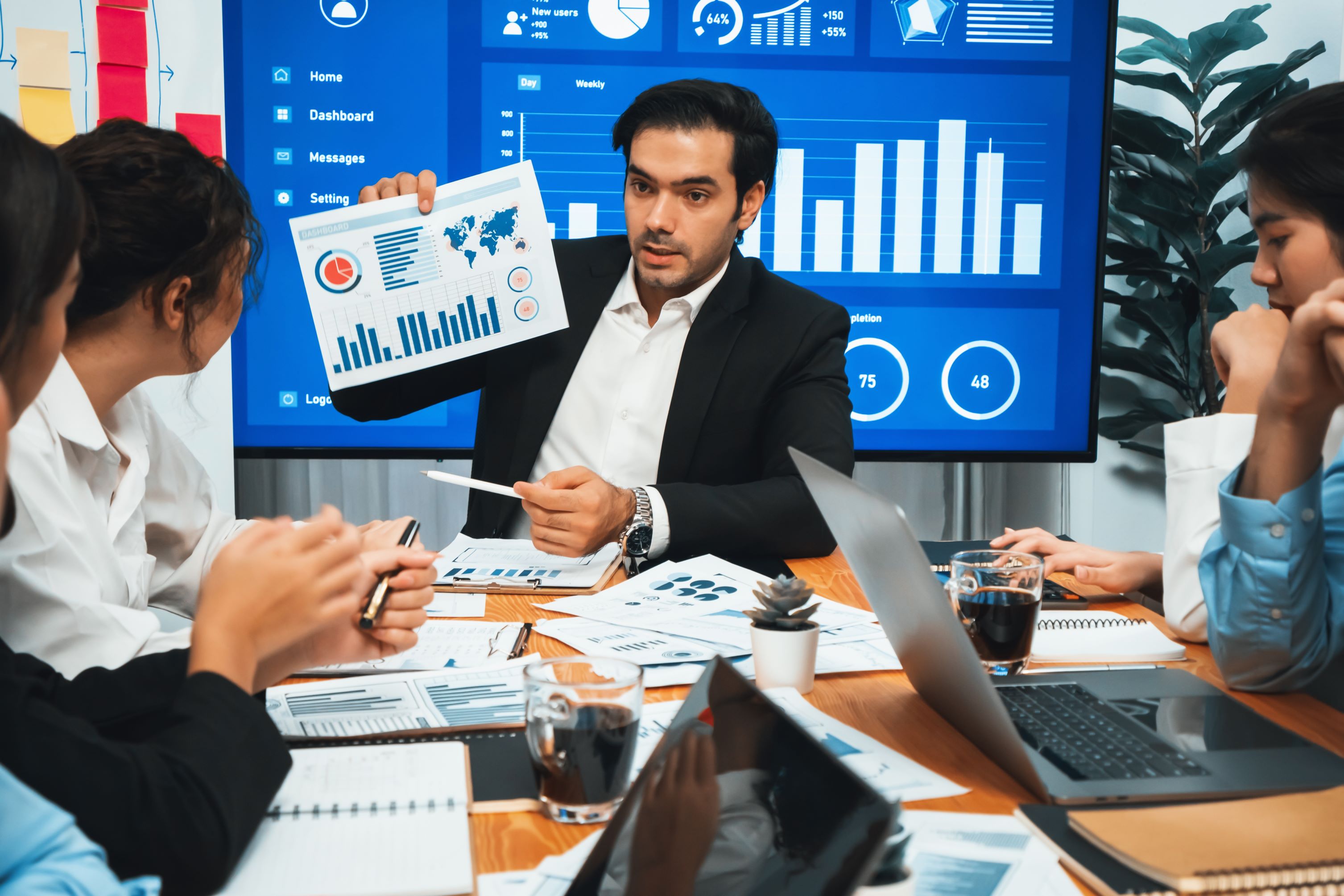 group of business analyst team analyzing financial data report. habiliment